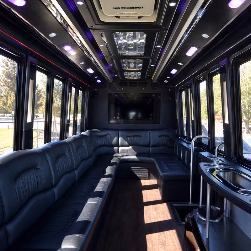Friends laughing during a Phoenix party bus celebration