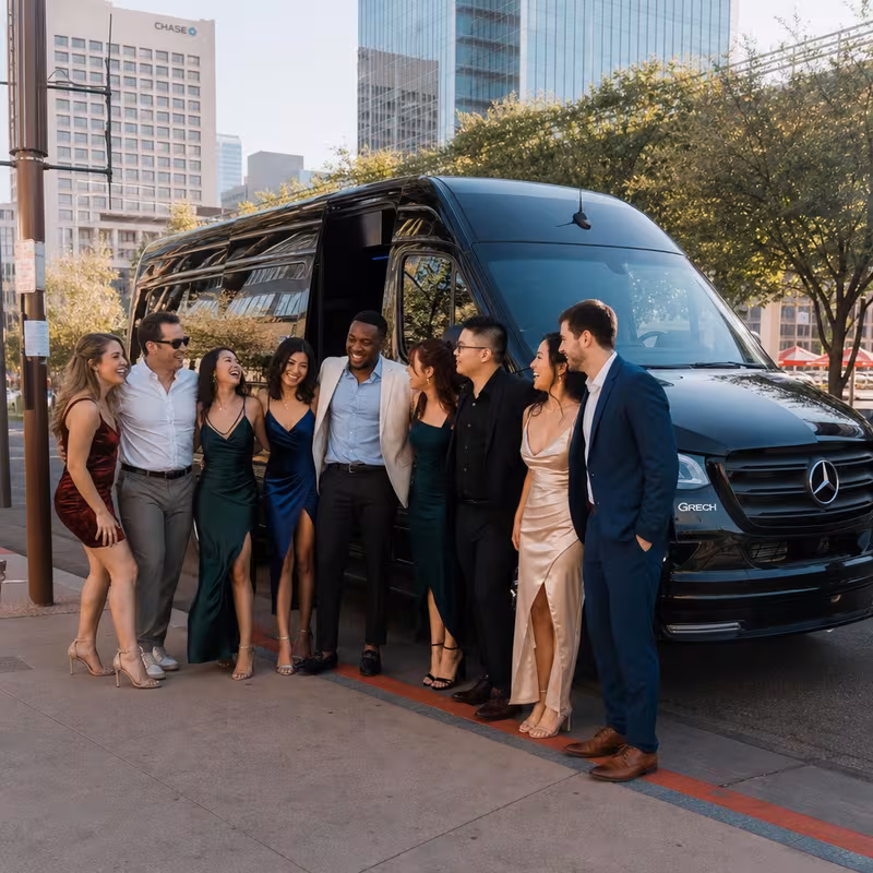 Group boarding a white charter bus for Bachelor & Bachelorette Transportation transportation in Phoenix