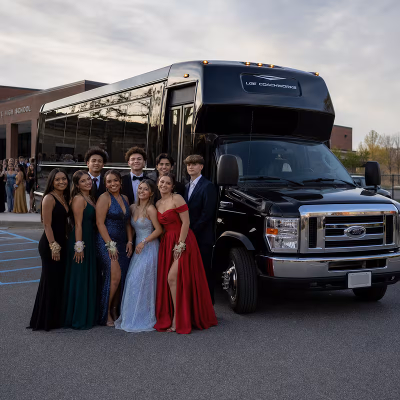 Group boarding a white charter bus for Prom & Homecoming Transportation transportation in Phoenix