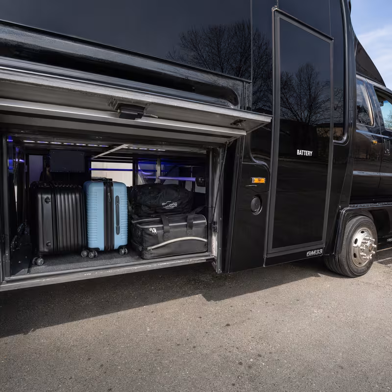 Party bus interior with wraparound leather seating and LED lighting in Phoenix